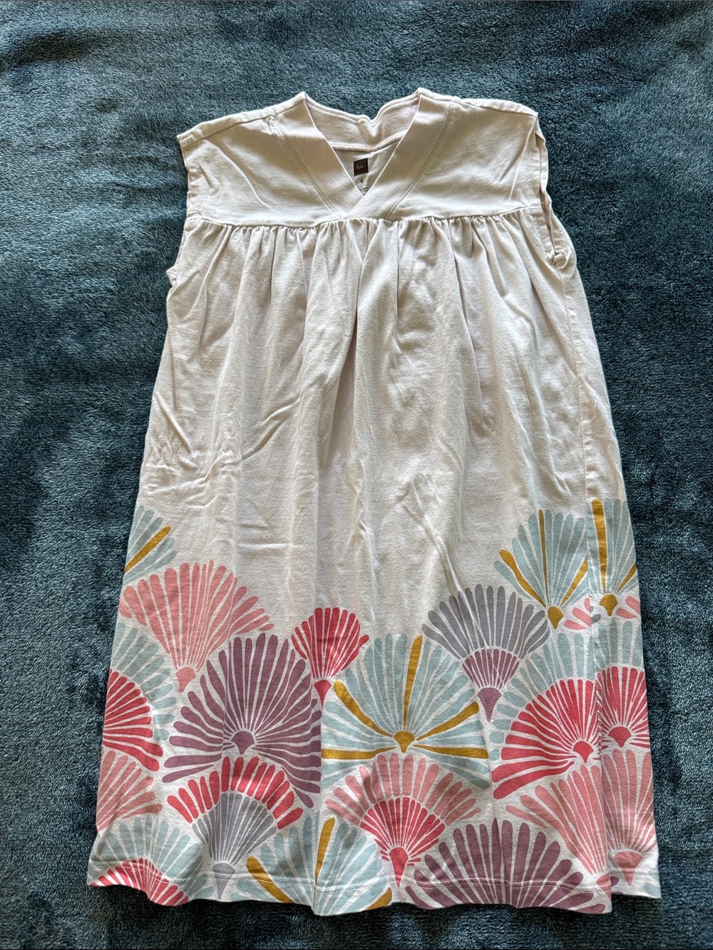 Tea Collection Faint Pink Sundress with Multicolor Shell Border and Gold Accents
